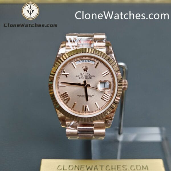 Super Clone Watches – Rolex Day Date 18K Rose Gold Sundust Roman Dial m228235 Presidential Bracelet